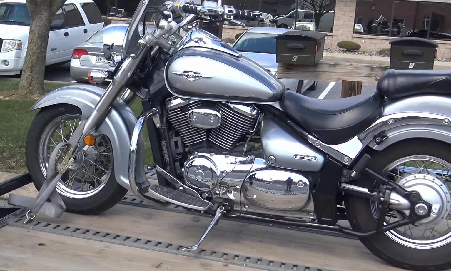 Cruiser motorcycle secured on a flatbed