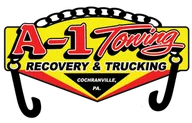 A-1 Towing Recovery & Trucking logo