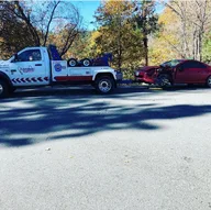 A Performance Towing INC. logo