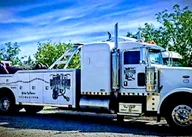 American Muffler And Towing logo