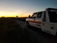 Associated Tow logo