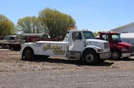 Dotty's Towing & Repair logo