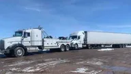 Every Miles Towing & Wrecker Service logo