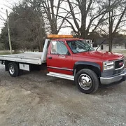 Faulk's Towing logo