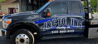 J & C Towing logo