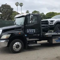 Love's Towing Inc. logo