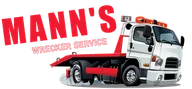 Mann's Wrecker service logo