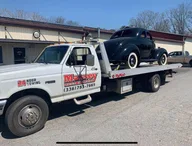 Massey Towing and Recovery logo