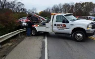 Mike's Towing logo