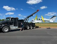 Mike Wells Towing logo