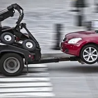 Omar's Towing logo