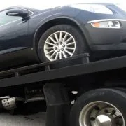 Rising Towing & Roadside Services logo