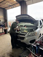Ron's Garage & Wrecker Services logo