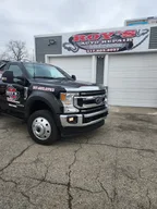 Roy's Auto Repair & Towing Services logo