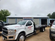 Woods Wrecker Service logo